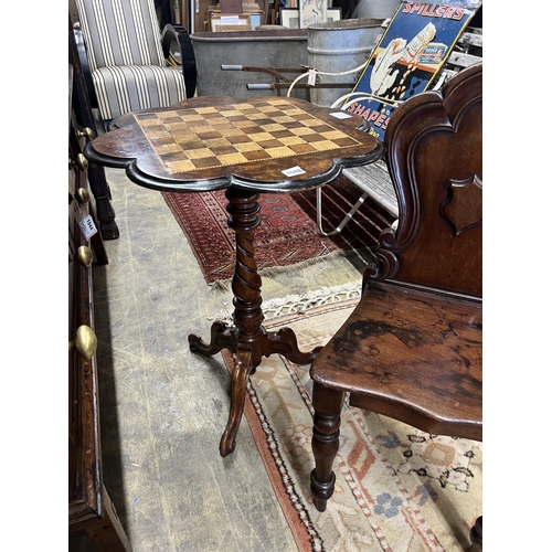 1048 - A Victorian mahogany hall chair and a Victorian walnut tripod games table, width 56cm, height 73cm... 