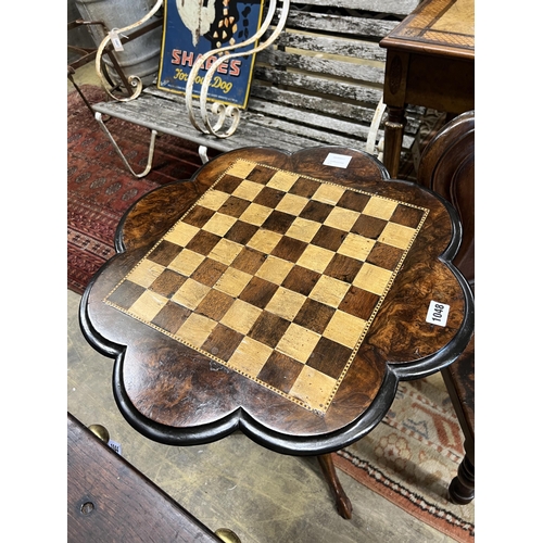 1048 - A Victorian mahogany hall chair and a Victorian walnut tripod games table, width 56cm, height 73cm... 