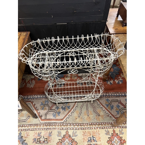 1050 - A Victorian painted wirework two tier pot stand, width 79cm, height 82cm