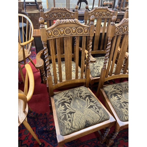 1059 - A set of six 1920's oak barley twist dining chairs, two with arms