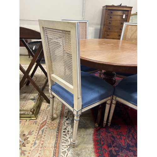 1060 - A set of four French style painted caned back dining chairs