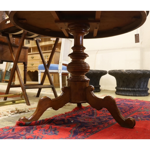 1061 - A 19th century French circular mahogany breakfast table, diameter 96cm, height 75cm