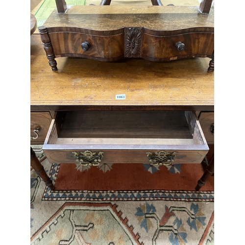 1063 - A Regency mahogany kneehole dressing table, width 94cm, depth 50cm, height 72cm together with an ear... 