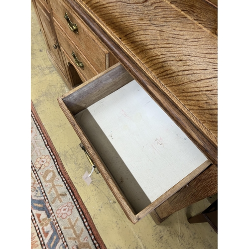 1075 - An early 20th century bleached oak dresser, width 165cm, depth 48cm, height 223cm