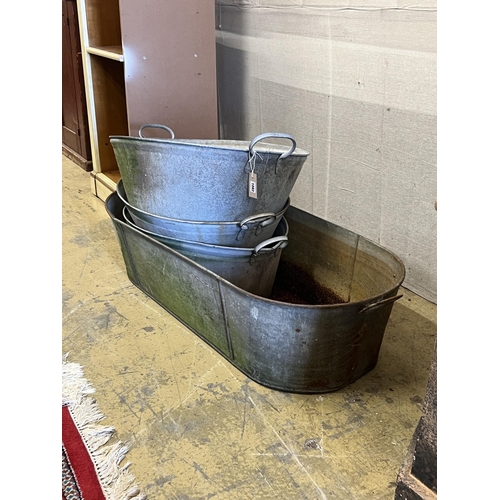 1082 - Four vintage galvanised containers, largest width 120cm, height 28cm