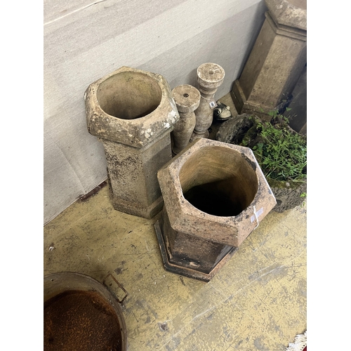 1084 - A pair of hexagonal terracotta chimney pots, larger height 71cm