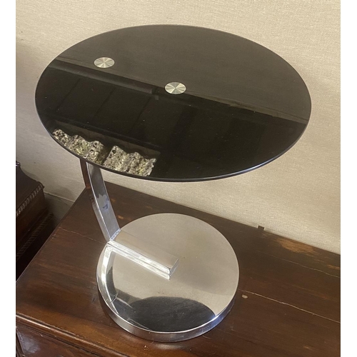 1086 - A chrome and black glass circular occasional table, diameter 45cm, height 54cm