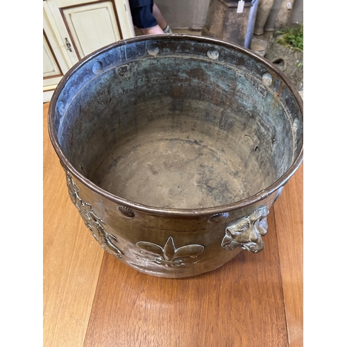 1120 - A 19th century Dutch embossed copper coal bin, diameter 49cm, height 45cm