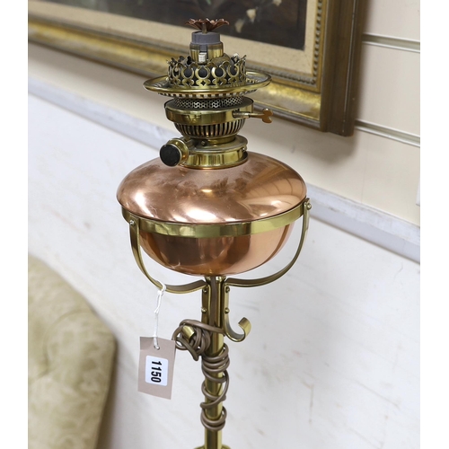 1150 - A late Victorian copper and brass telescopic oil standard lamp converted to electricity, height 156c... 