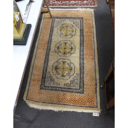 1161 - A Tibetan rug, 180 x 94cm