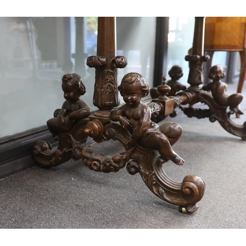 1168 - A late 19th century rectangular continental carved walnut centre table with cherub underframe, width... 