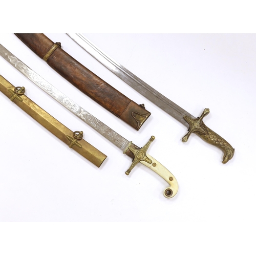 1257 - Two reproduction swords; a Victorian style naval design Mameluke sword, together with an Indian styl... 