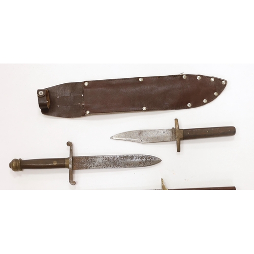 1259 - A Bowie knife with wooden grip, in a leather sleeve, blade etched with Siege of The Alamo 1836 Col.... 