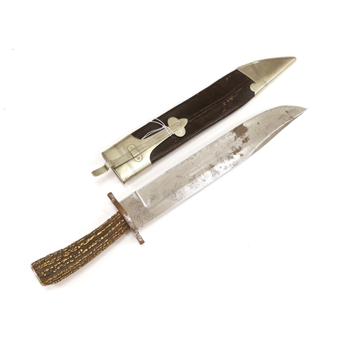 1262 - A Victorian Bowie knife, by Lund, Cornhill London, with horn handle and leather scabbard, blade 30.2... 