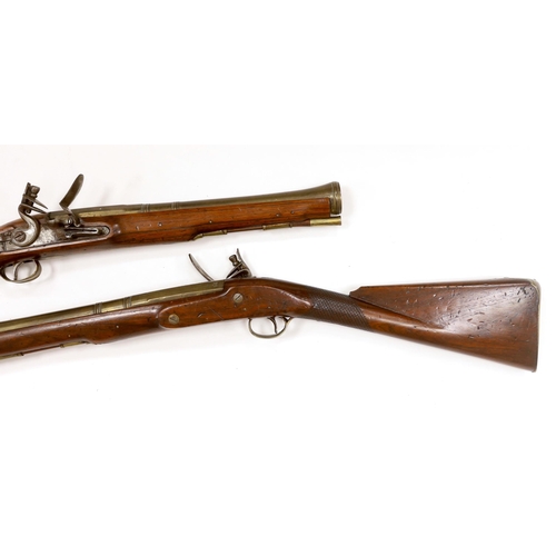 1263 - A pair of reproduction 'York Mail' flintlock blunderbusses in a late 18th century style. Brass barre... 