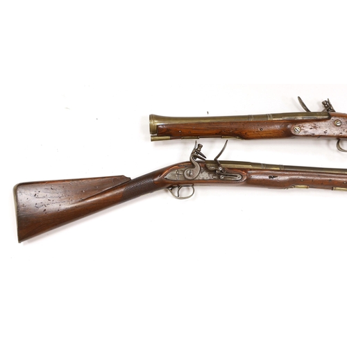 1263 - A pair of reproduction 'York Mail' flintlock blunderbusses in a late 18th century style. Brass barre... 