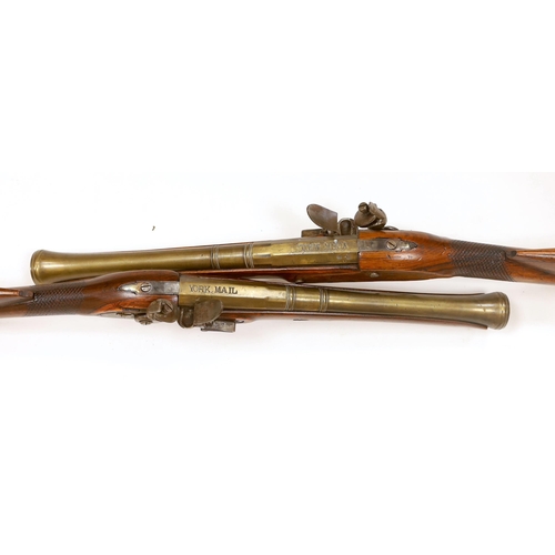 1263 - A pair of reproduction 'York Mail' flintlock blunderbusses in a late 18th century style. Brass barre... 