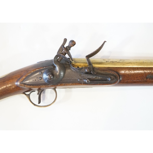 1274 - An English brass barrel flintlock blunderbuss by H W Mortimer, late 18th century, flared brass barre... 