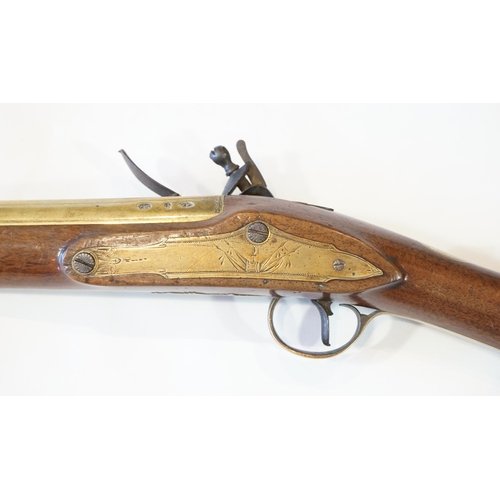 1274 - An English brass barrel flintlock blunderbuss by H W Mortimer, late 18th century, flared brass barre... 