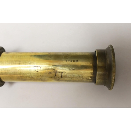 1284 - A WWI three draw brass telescope with sun shade and leather outer cover by Taylor Taylor Hobson Ltd.... 