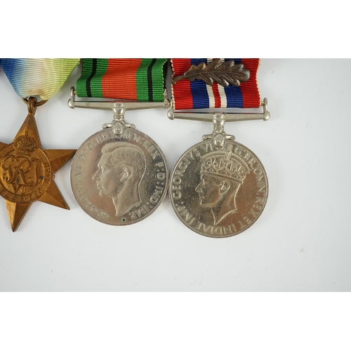 1299 - An unnamed WWII DSC group, including; War Medal with mentioned in despatches oak leaf, Defence Medal... 