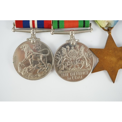 1299 - An unnamed WWII DSC group, including; War Medal with mentioned in despatches oak leaf, Defence Medal... 