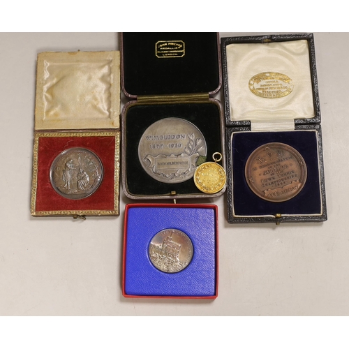 1302 - Tennis Interest. A group of 1890's to 1920's Tennis prize medallions presented to Herbert William Wr... 