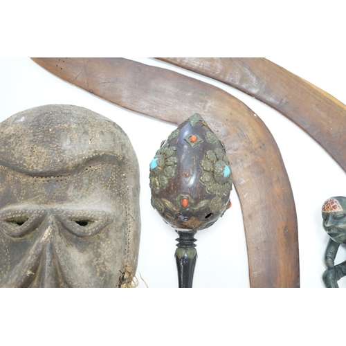 1303 - Two Aboriginal boomerangs, an African mask, a painted lion figure and four other items (8)