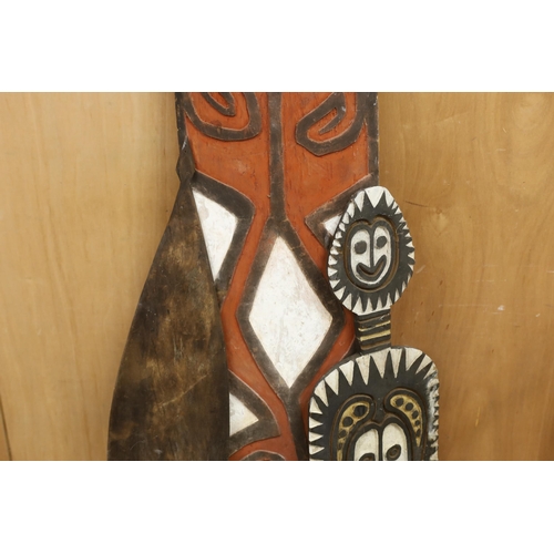 1304 - Three Papua New Guinea painted wooden shields, tallest 164cm