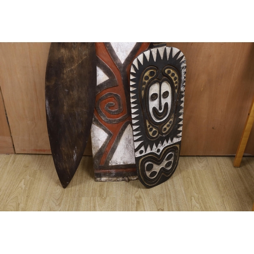 1304 - Three Papua New Guinea painted wooden shields, tallest 164cm