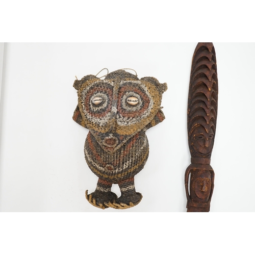 1305 - Two Papua New Guinea figures, a tall carved wooden figure with label reading; Guam or Misingi River... 