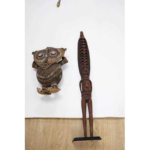 1305 - Two Papua New Guinea figures, a tall carved wooden figure with label reading; Guam or Misingi River... 