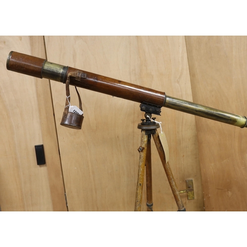 1315 - A WWI leather cased telescope and tripod, 57cm