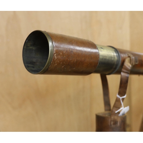 1315 - A WWI leather cased telescope and tripod, 57cm