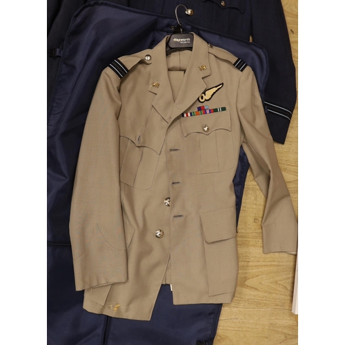 1316 - A collection of post-war RAF uniforms, comprising; two caps, double-breasted overcoat, dress uniform... 