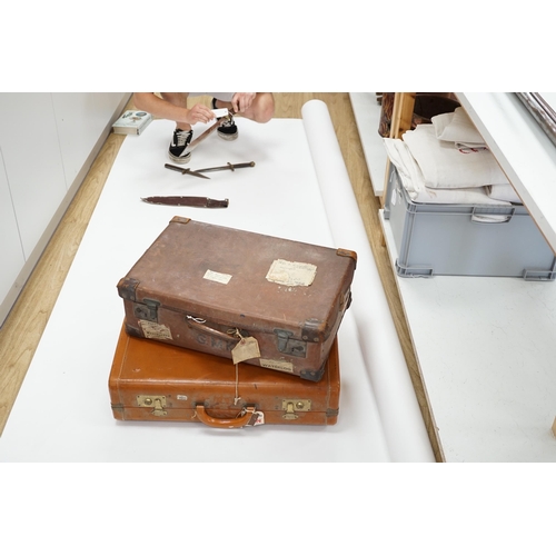 1336 - Two vintage suitcases with various labels including British Railways Waterloo, the largest 61cm wide... 