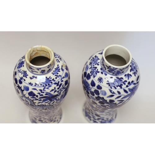 1348 - A pair of Chinese blue and white 'dragon vases and covers, Late 19th century, 29cm high