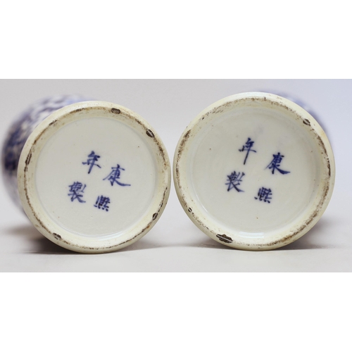 1348 - A pair of Chinese blue and white 'dragon vases and covers, Late 19th century, 29cm high