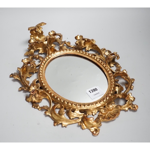 1361 - A late 19th century Florentine giltwood mirror, 43cm