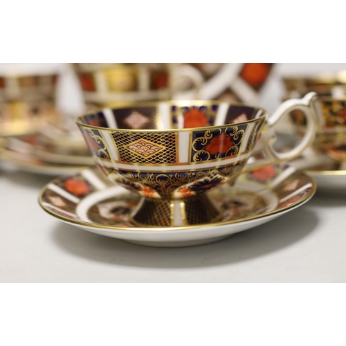 1380 - A quantity of Royal Crown Derby cups and saucers, pattern 1128