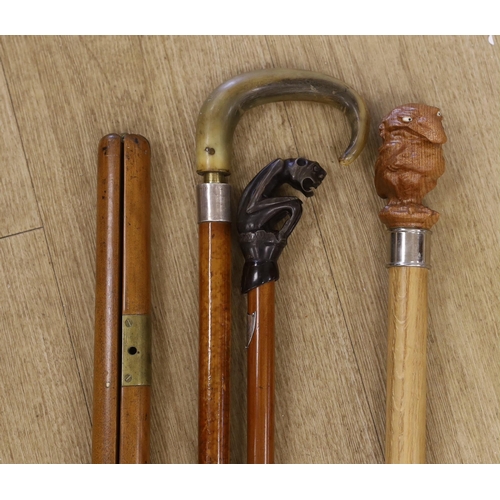 1384 - Four canes / walking sticks including a horse measuring stick and a military pace stick