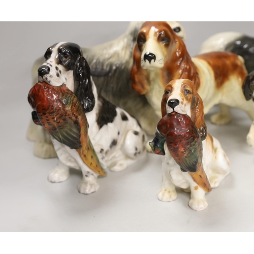 1388 - A group of six ceramic models of dogs including Royal Doulton and Beswick