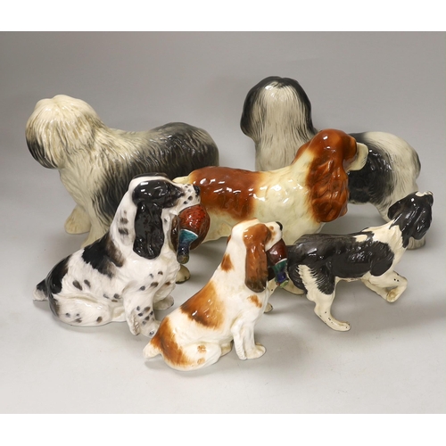 1388 - A group of six ceramic models of dogs including Royal Doulton and Beswick