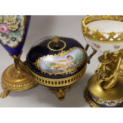 1391 - A pair of Sevres style porcelain ormolu mounted vases, a similar putti stemmed cup and a bowl and co... 