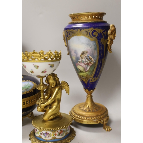 1391 - A pair of Sevres style porcelain ormolu mounted vases, a similar putti stemmed cup and a bowl and co... 