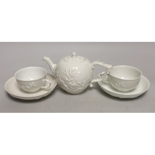 1400 - A 18th century Meissen teapot and two teacups and saucers, c.1740