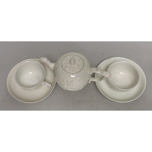 1400 - A 18th century Meissen teapot and two teacups and saucers, c.1740