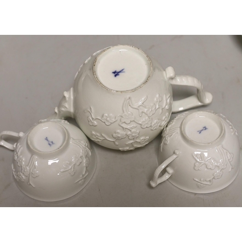 1400 - A 18th century Meissen teapot and two teacups and saucers, c.1740