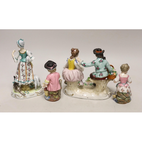 1403 - Four German porcelain figures and figural groups, including  Sitzendorf, tallest 16.5cm