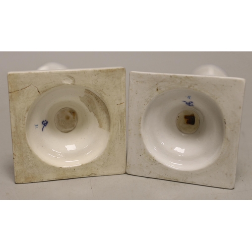 1404 - A pair of German porcelain candlesticks, marked JR, with applied floral decoration, 18cm